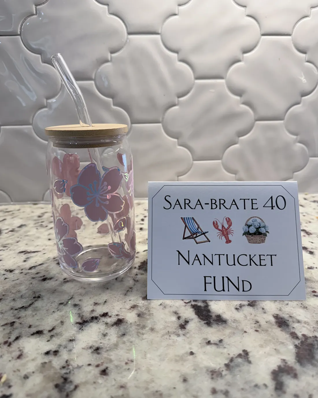 Glass tumbler with iridescent hibiscus flowers