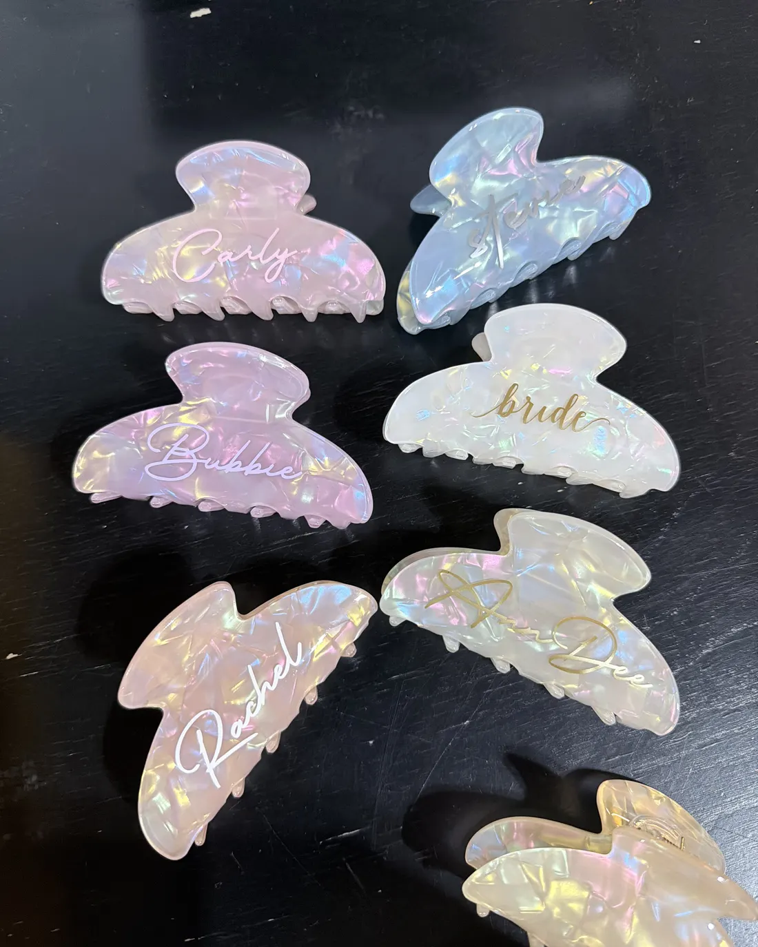 Iridescent claw clips personalized for a bridal party